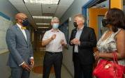 Rodger Harvey, professor of ocean and earth sciences (center), talks about climate change before touring the COSMIC Lab with (l-r)Virginia House Del. Angelia Williams Graves, Gubernatorial Candidate and Former Gov. Terry McAuliffe and President Brian O. Hemphill, Ph.D. Photo Chuck Thomas/ODU.