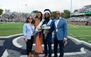 Old Dominion University President Brian O. Hemphill, Ph.D., and First Lady Marisela Rosas Hemphill, Ph.D., pose with the Homecoming Royalty Court winners Demetré South and Caitlyn Kidd. Photo Chuck Thomas/ODU