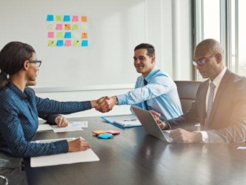 Two business colleagues shaking hands